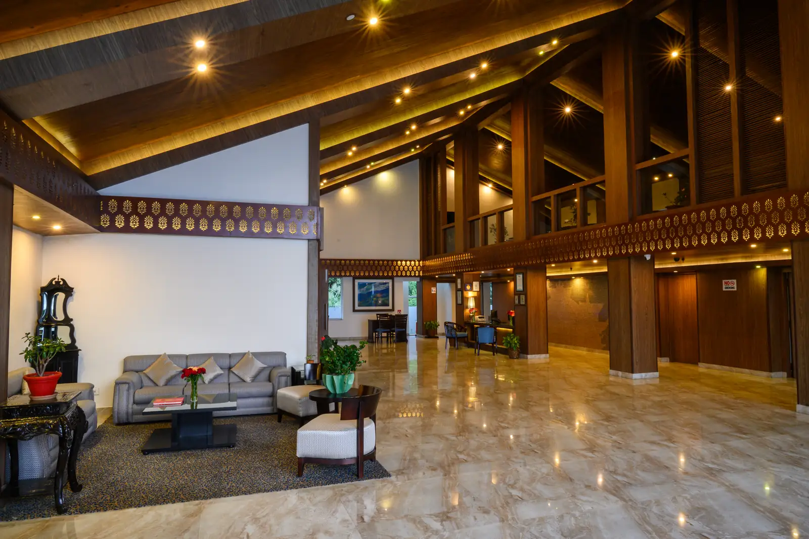 Grand double-height lobby entrance at Sinclairs Retreat Kalimpong