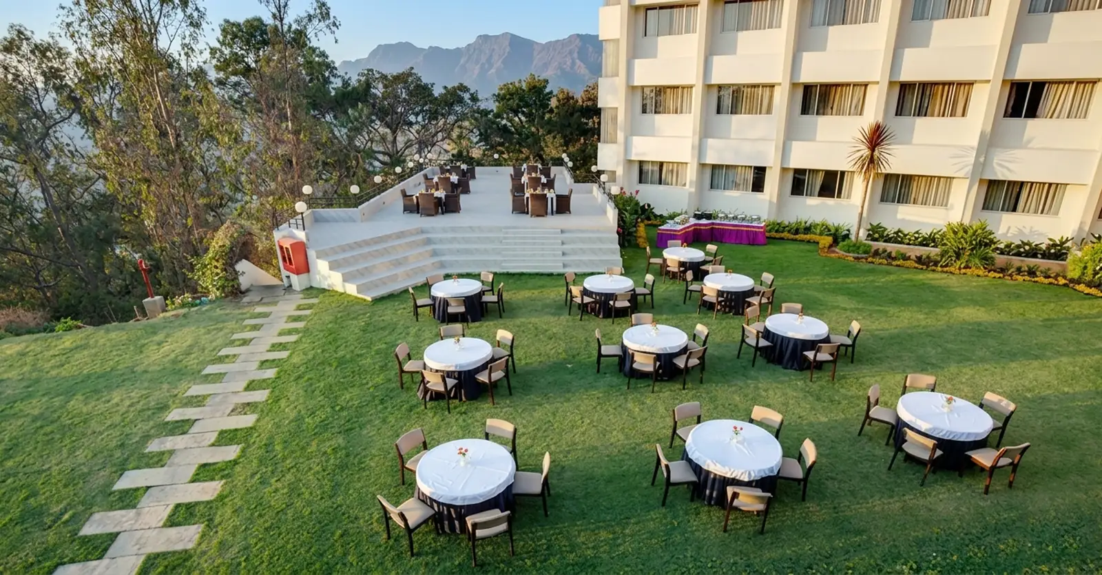 The Main Lawn, set up for an outdoor banquet at Sinclairs Ooty