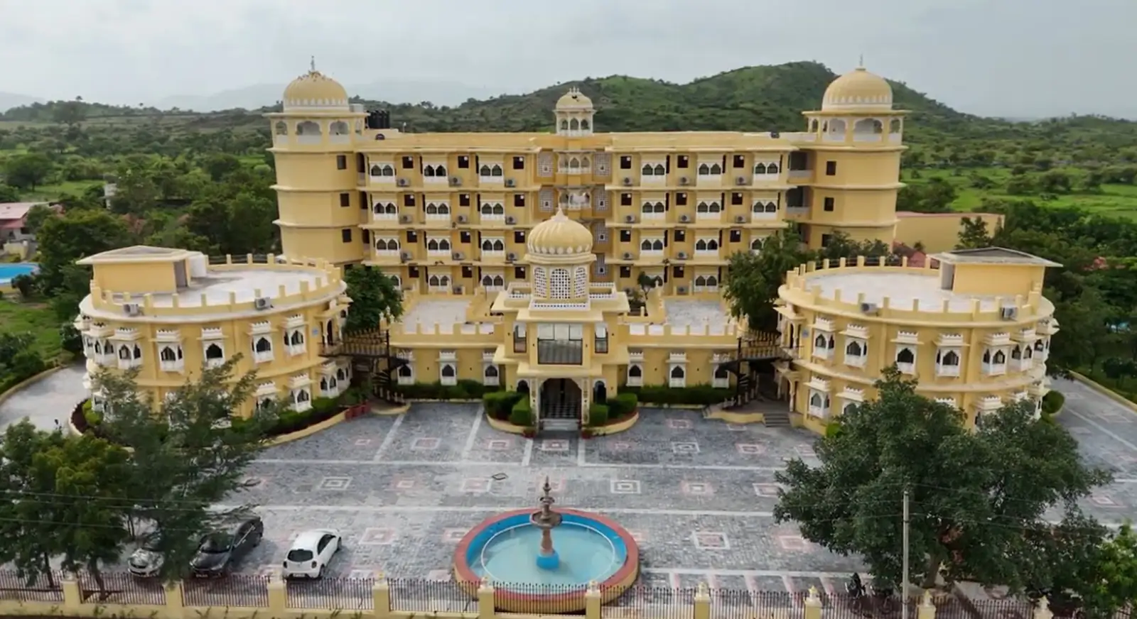 Aerial view of Sinclairs Palace Retreat Udaipur and its fountain courtyard